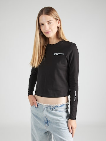 Calvin Klein Jeans T-shirt 'MULTI PLACEMENT' i svart: framsida