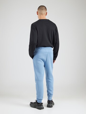Nike Sportswear Tapered Broek 'TCH FLC' in Blauw