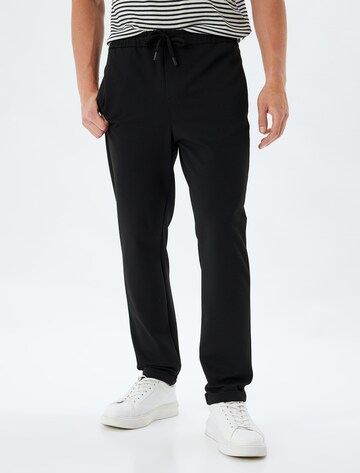 Koton Trousers in Black: front