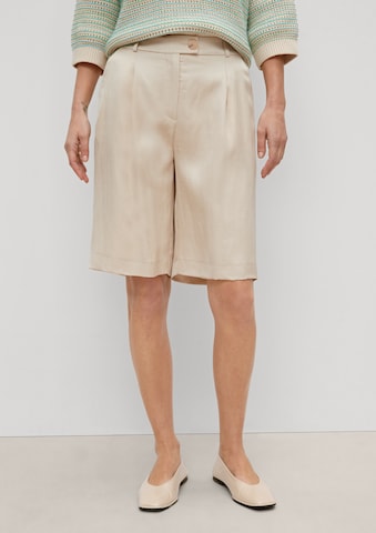 Wide leg Pantaloni con pieghe di COMMA in beige