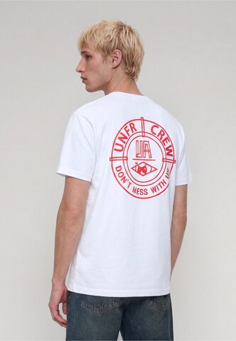 Unfair Athletics T-Shirt 'Dmwu' in Weiß: Vorderseite