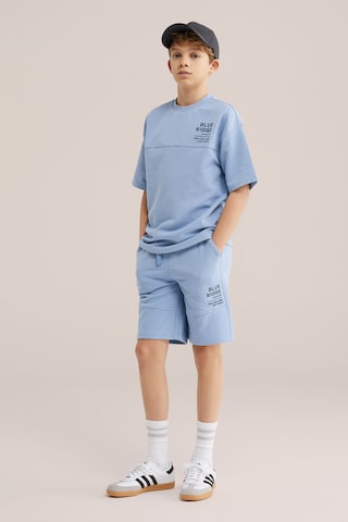 WE Fashion Regular Housut värissä sininen