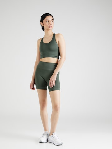 Skinny Pantalon de sport 'Tif' Hummel en vert