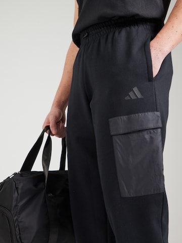 ADIDAS SPORTSWEAR Tapered Παντελόνι φόρμας σε μαύρο