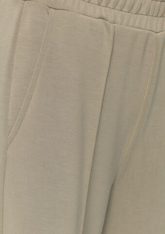 s.Oliver Wide leg Trousers with creases in Beige