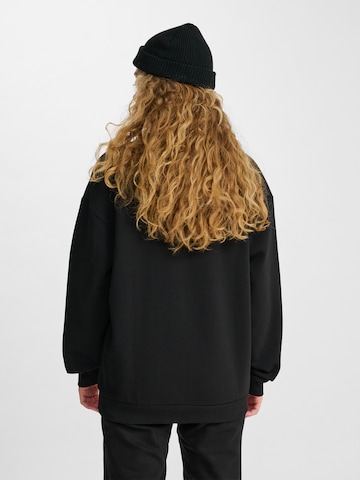 Sweat-shirt Hummel en noir