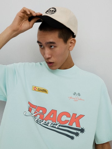Bershka T-Shirt 'SAVAG' in Blau