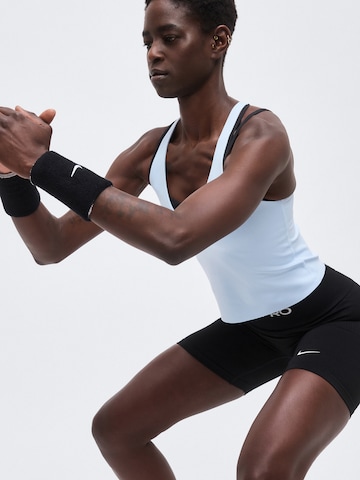 Skinny Pantaloni sport 'Seamless' de la NIKE pe negru