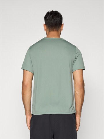NIKE Funktionsshirt 'Miler' in Grün