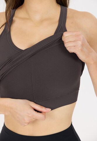Athlecia Sports top in Brown