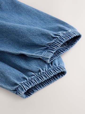 Ensemble Next en bleu