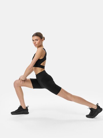 Cardio Bunny - Bustier Sujetador deportivo 'CUT SCULPT' en negro