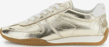 Baskets basses CAFè NOIR en or : devant