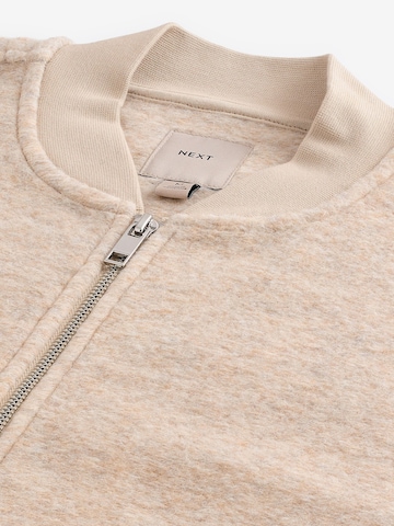 Next Tussenjas in Beige