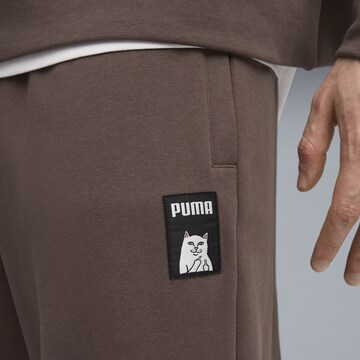 PUMA Wide leg Broek 'Puma x Ripndip' in Bruin