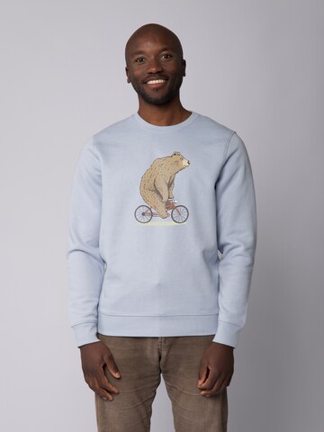 Sweat-shirt ' Fahrradbär ' Watapparel en bleu : devant