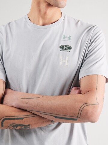Tricou funcțional de la UNDER ARMOUR pe gri