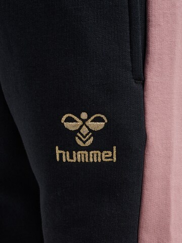 Effilé Pantalon Hummel en noir