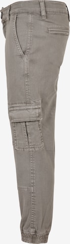 Tapered Pantaloni di Urban Classics in grigio