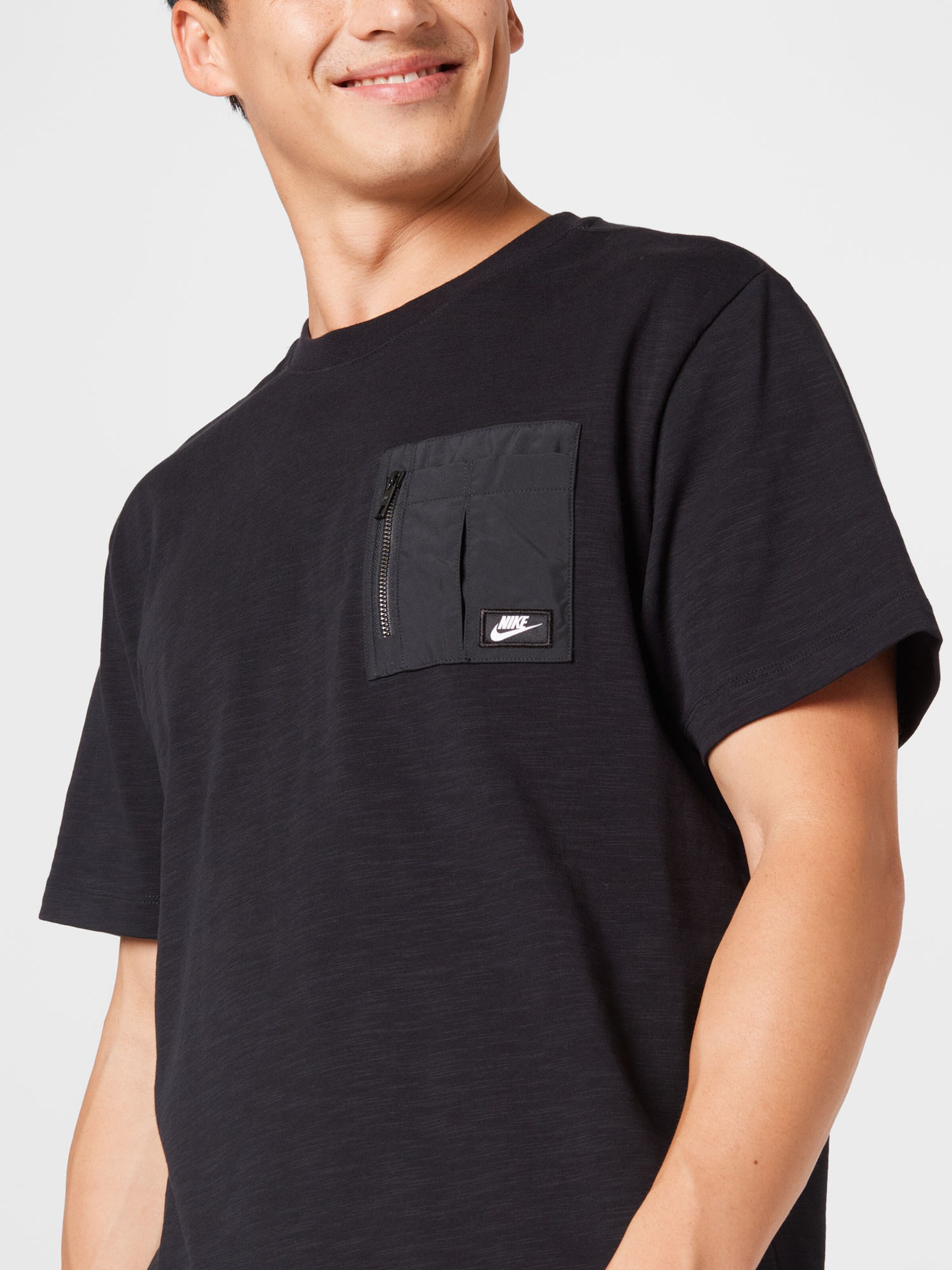 Homme T-Shirt Nike Sportswear en Noir 