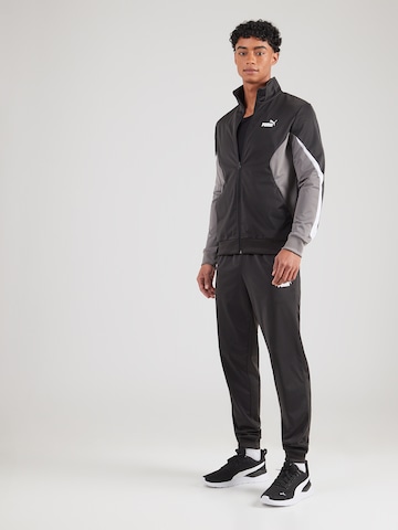 PUMA Облекло за трениране 'ESS' в черно: отпред