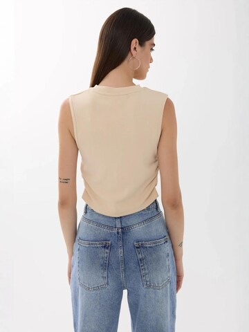 Top di Hiccup in beige