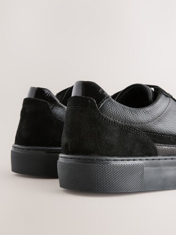 Baskets basses Next en noir