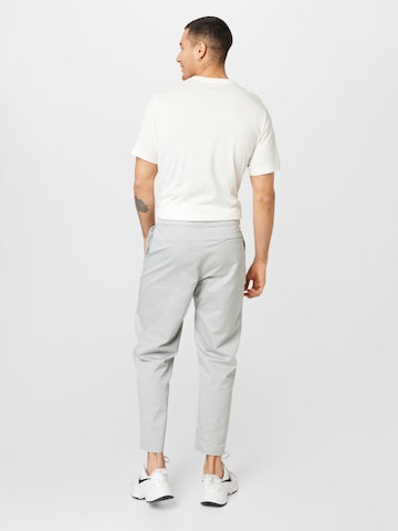 Regular Pantaloni de la Nike Sportswear pe gri