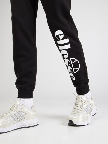 ELLESSE - Tapered Pantalón 'Marana' en negro