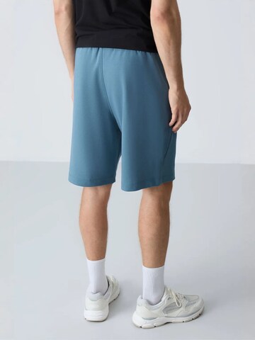 Tommy Life Loosefit Broek in Blauw