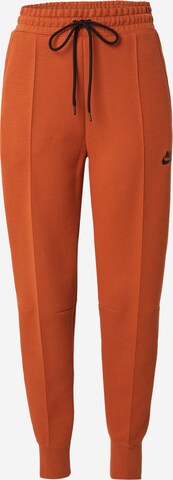Nike Sportswear Broek 'TCH FLC' in Oranje: voorkant