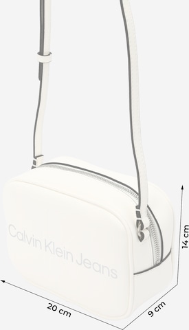 Calvin Klein Jeans Taška přes rameno – bílá