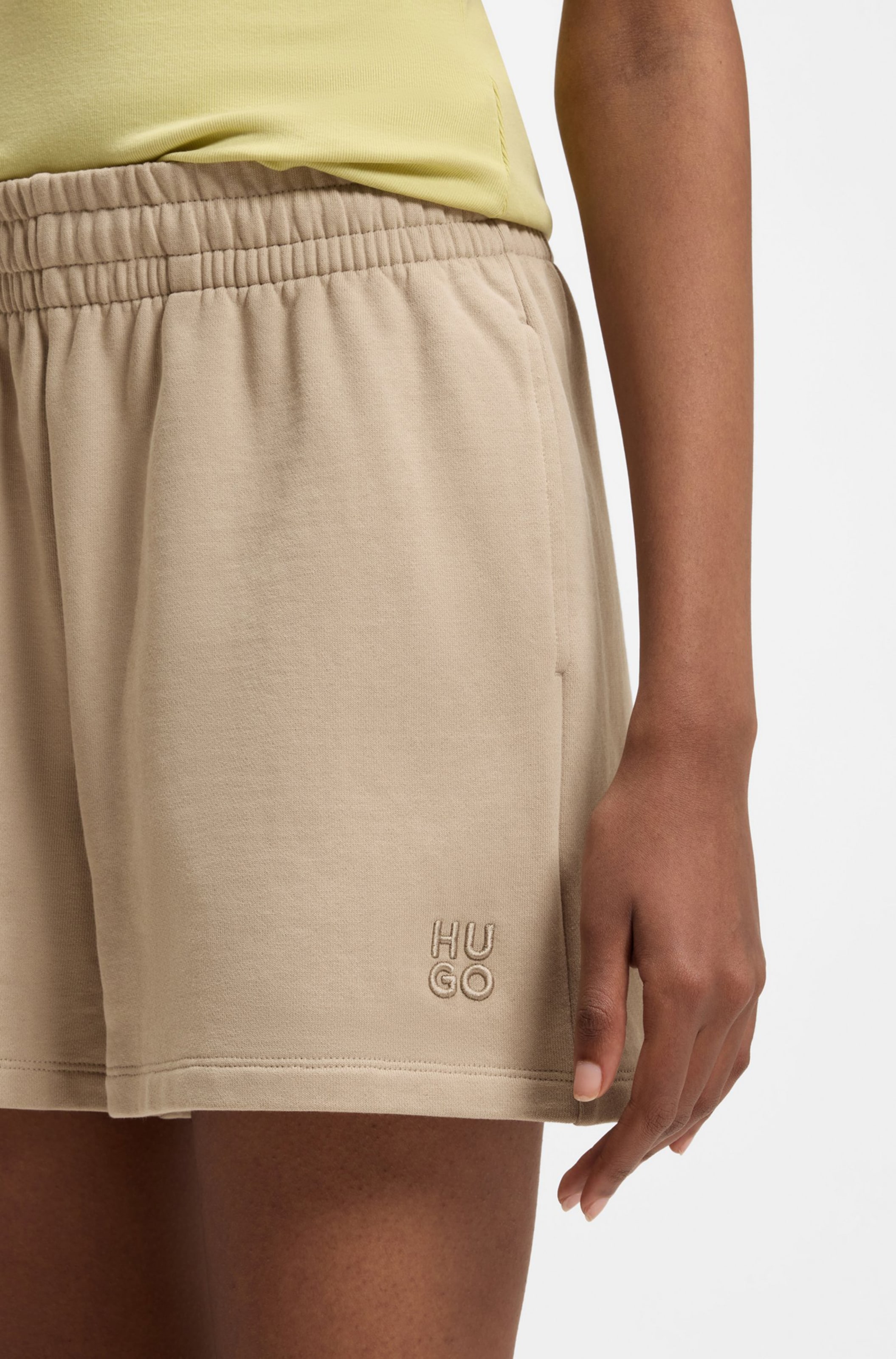 HUGO Loose fit Pants 'Ninosta' in Brown
