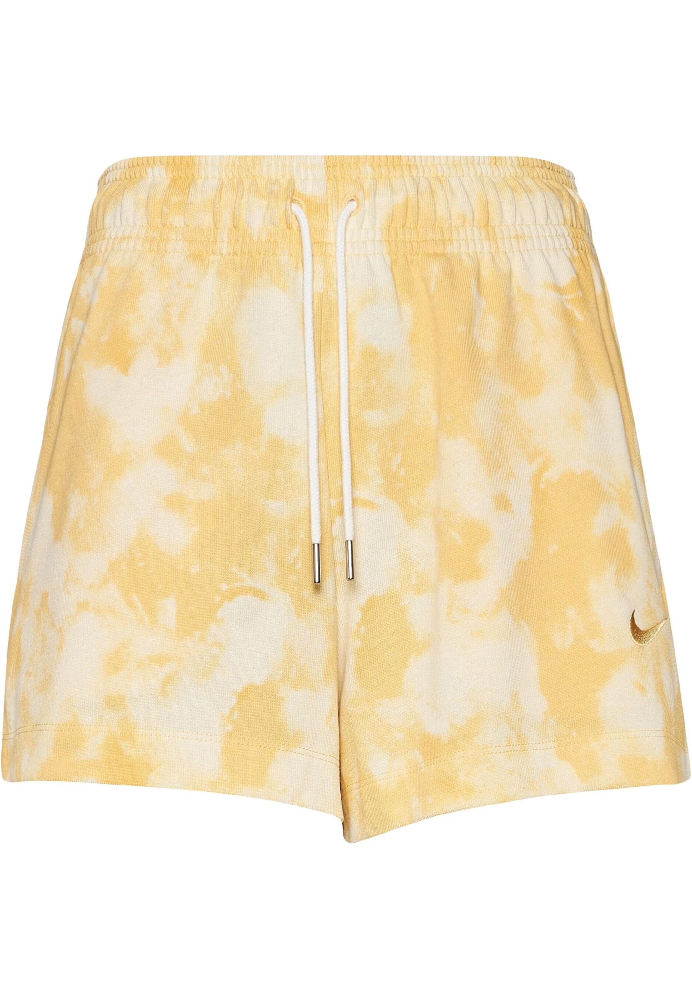 Nike Sportswear Loose fit Pants in Yellow: front