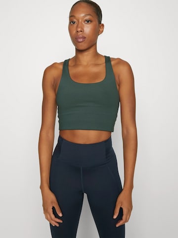 Girlfriend Collective Korzetová Sportovní podprsenka ' Paloma ' – zelená: přední strana