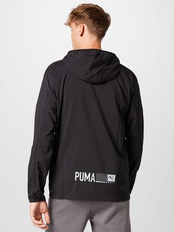 PUMA Trainingsanzug in Schwarz