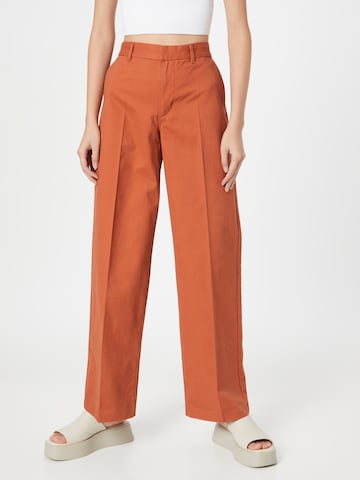 LEVI'S ® Loose fit Trousers with creases 'Baggy Trouser' in Orange: front