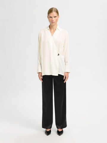 Wide leg Pantaloni con pieghe di SELECTED in nero