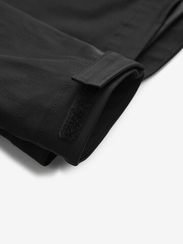 Veste fonctionnelle Next en noir