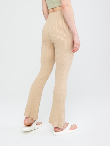 Flared Pantaloni 'Mavis' di EDITED in beige