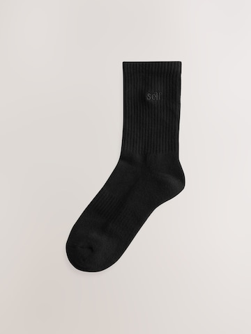 self. Socks in Black