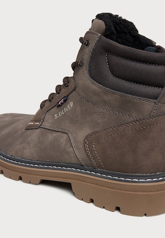 s.Oliver - Botas con cordones en verde
