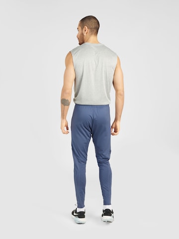 NIKE Slimfit Športne hlače 'FC Barcelona' | modra barva