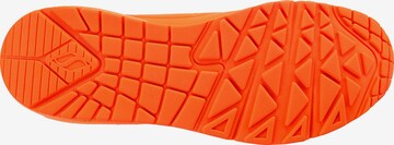 Baskets basses SKECHERS en orange