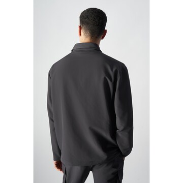 Champion Authentic Athletic Apparel Sportjacke 'Legacy' in Schwarz