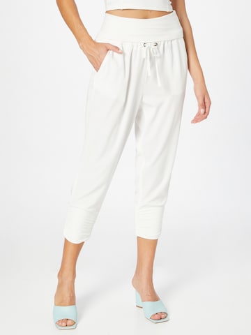 Cream Tapered Trousers in White: front