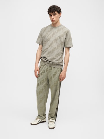 ADIDAS ORIGINALS - Pierna ancha Pantalón 'Firebird' en verde