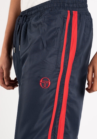 Sergio Tacchini Alt kitsenev Spordipüksid 'DANTE', värv sinine