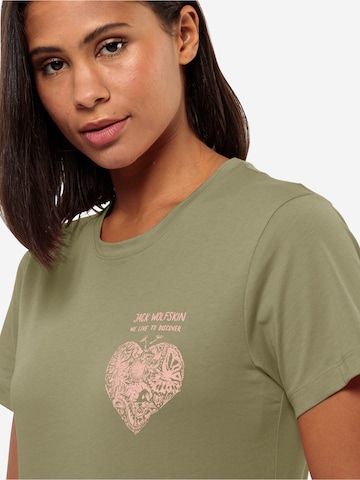 JACK WOLFSKIN T-shirt 'DISCOVER HEART' i grön