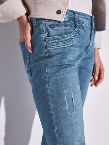 STREET ONE Slimfit Jeansy 'Jane' w kolorze niebieski